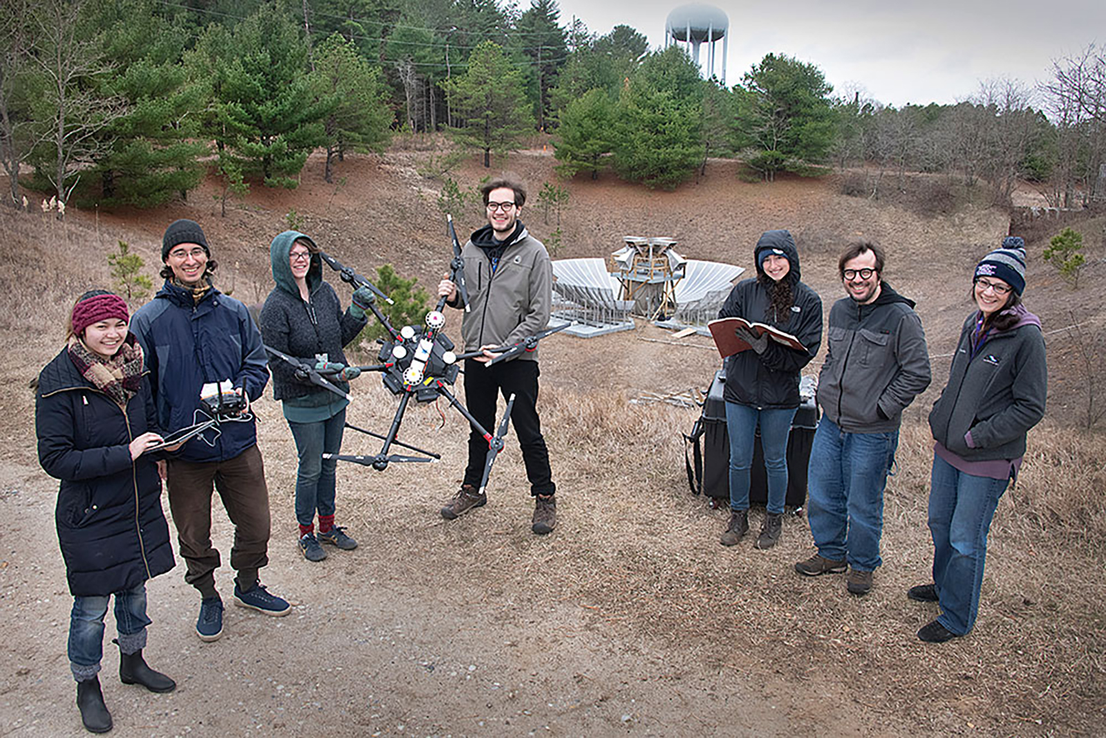 group of people with drone