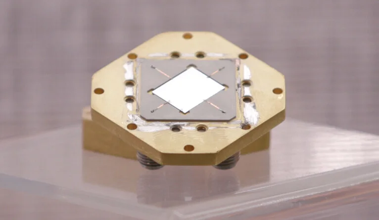 A qubit, shown here, holds a bit of quantum data. (Photo by Dan Renzetti)